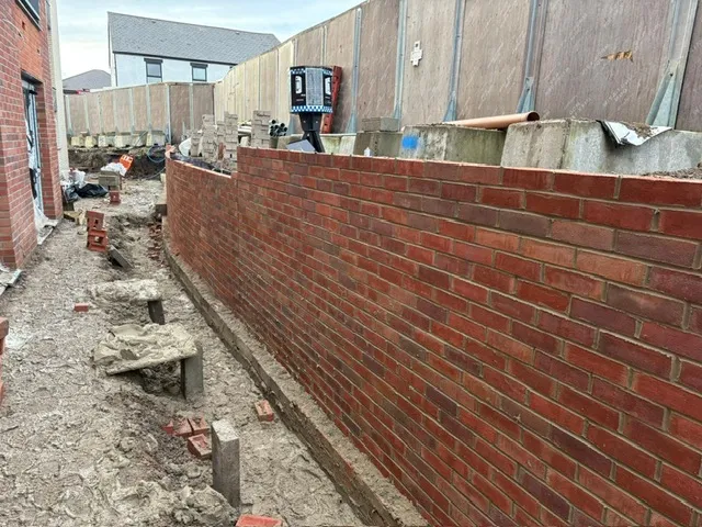 A stunning brick wall showcasing our expert craftsmanship and attention to detail.